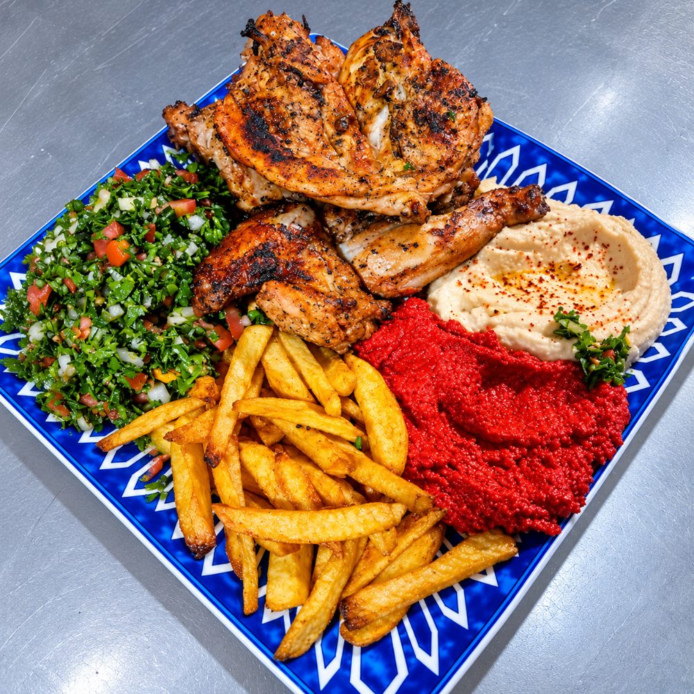 Medio pollo asado+tabule+papas